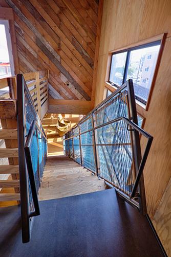 Celery - the stair from above with woven cord panels.